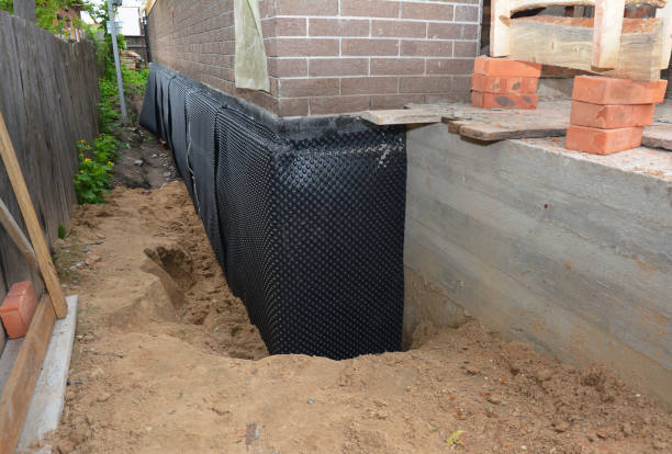 Happy homeowners after waterproofing job in New Lexington